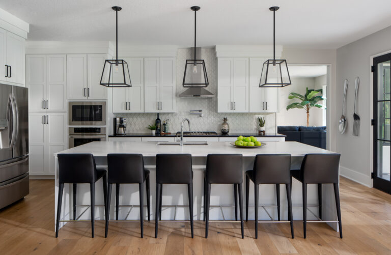 Contemporary white kitchen with modern barstools