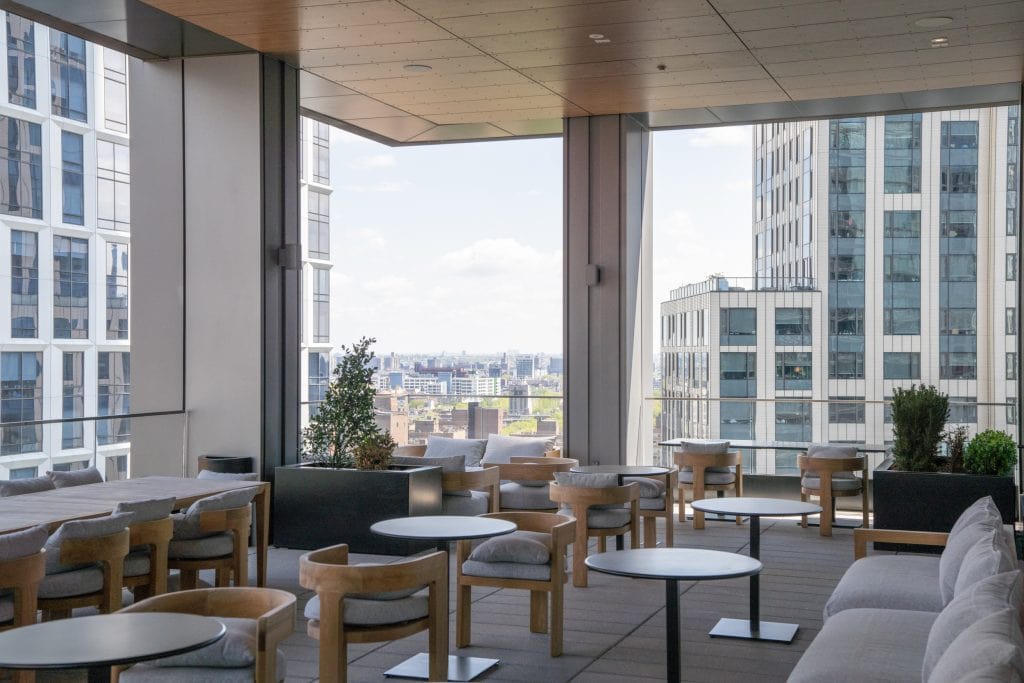 Commercial architectural photographer showing the view from a terrace overlooking Brooklyn