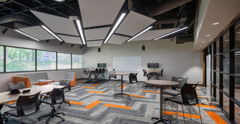 Corporate workspace photography in Nashville featuring well-design acoustic ceiling panels. 
