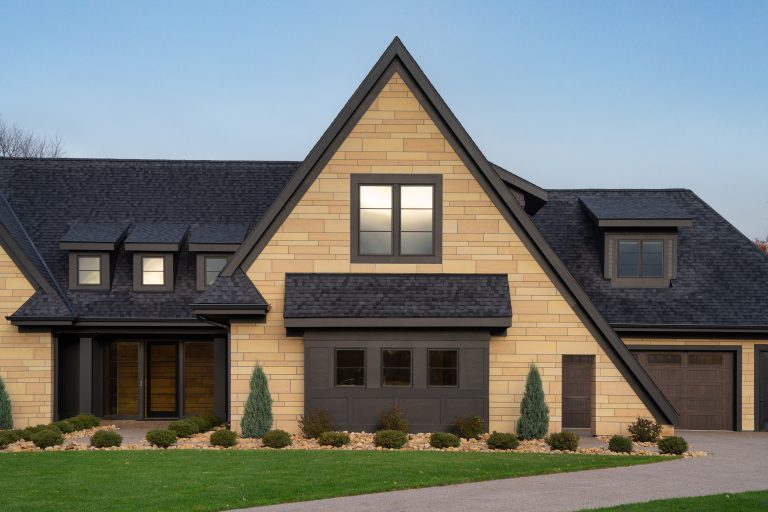 A frame home with stone facade